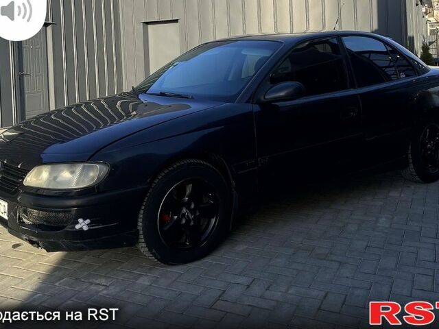 Чорний Опель Омега, об'ємом двигуна 2 л та пробігом 360 тис. км за 1999 $, фото 1 на Automoto.ua