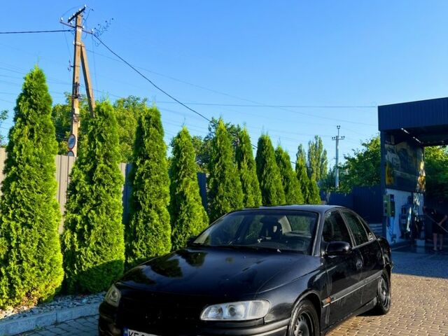 Чорний Опель Омега, об'ємом двигуна 2 л та пробігом 530 тис. км за 2200 $, фото 1 на Automoto.ua