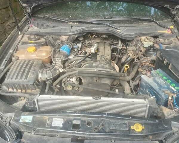 Чорний Опель Омега, об'ємом двигуна 2 л та пробігом 300 тис. км за 2500 $, фото 1 на Automoto.ua