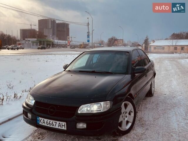 Черный Опель Омега, объемом двигателя 3 л и пробегом 370 тыс. км за 1650 $, фото 1 на Automoto.ua