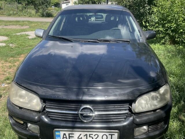 Черный Опель Омега, объемом двигателя 2.5 л и пробегом 350 тыс. км за 1600 $, фото 1 на Automoto.ua