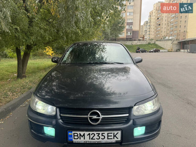 Черный Опель Омега, объемом двигателя 2.96 л и пробегом 235 тыс. км за 2700 $, фото 1 на Automoto.ua