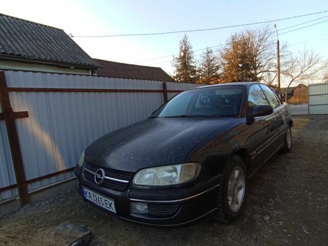 Черный Опель Омега, объемом двигателя 2 л и пробегом 180 тыс. км за 2500 $, фото 1 на Automoto.ua