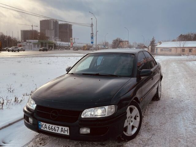 Черный Опель Омега, объемом двигателя 3 л и пробегом 370 тыс. км за 1650 $, фото 1 на Automoto.ua