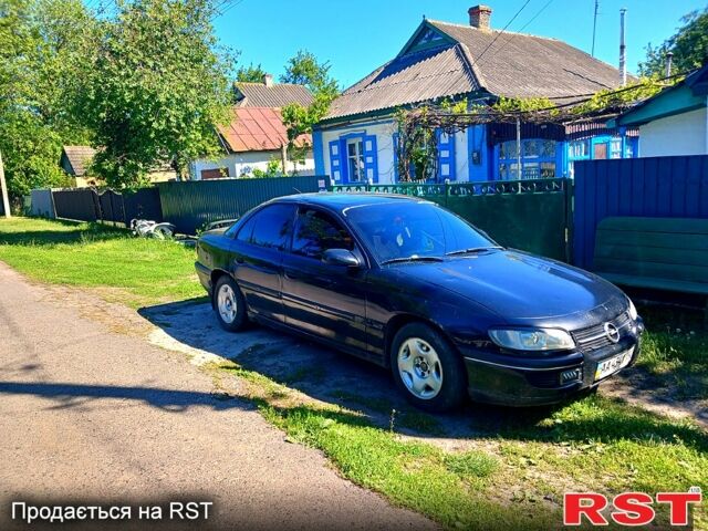 Чорний Опель Омега, об'ємом двигуна 2 л та пробігом 290 тис. км за 500 $, фото 1 на Automoto.ua
