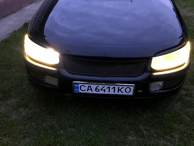 Черный Опель Омега, объемом двигателя 2.5 л и пробегом 111 тыс. км за 3200 $, фото 1 на Automoto.ua