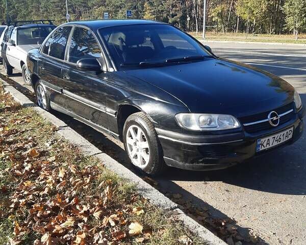 Черный Опель Омега, объемом двигателя 2 л и пробегом 200 тыс. км за 3300 $, фото 1 на Automoto.ua