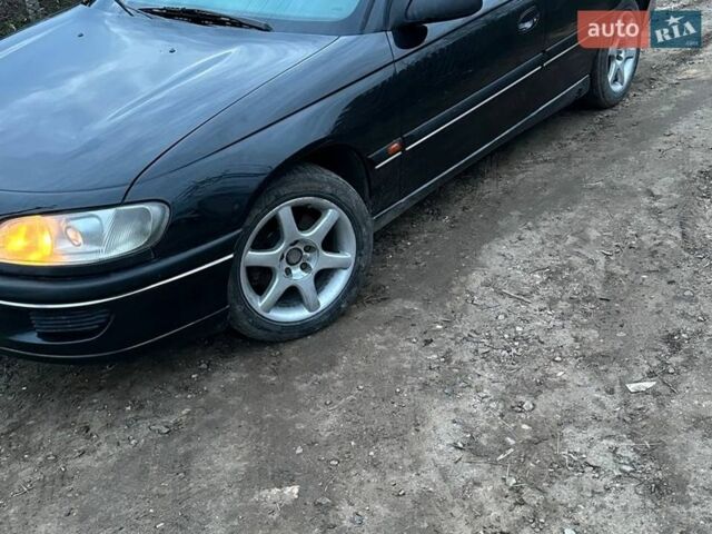 Черный Опель Омега, объемом двигателя 2 л и пробегом 388 тыс. км за 2900 $, фото 1 на Automoto.ua