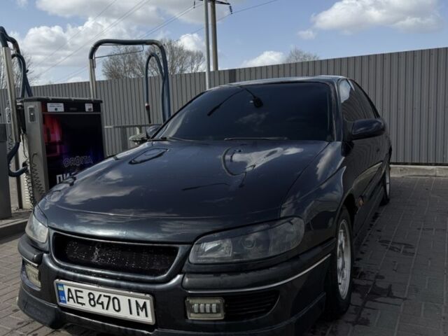 Чорний Опель Омега, об'ємом двигуна 2 л та пробігом 406 тис. км за 3100 $, фото 1 на Automoto.ua