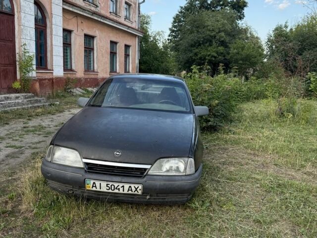 Черный Опель Омега, объемом двигателя 2 л и пробегом 200 тыс. км за 450 $, фото 1 на Automoto.ua