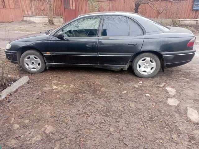 Черный Опель Омега, объемом двигателя 2 л и пробегом 250 тыс. км за 1450 $, фото 1 на Automoto.ua