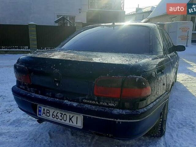 Черный Опель Омега, объемом двигателя 2 л и пробегом 500 тыс. км за 1300 $, фото 1 на Automoto.ua