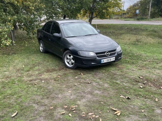 Черный Опель Омега, объемом двигателя 2 л и пробегом 400 тыс. км за 2300 $, фото 1 на Automoto.ua
