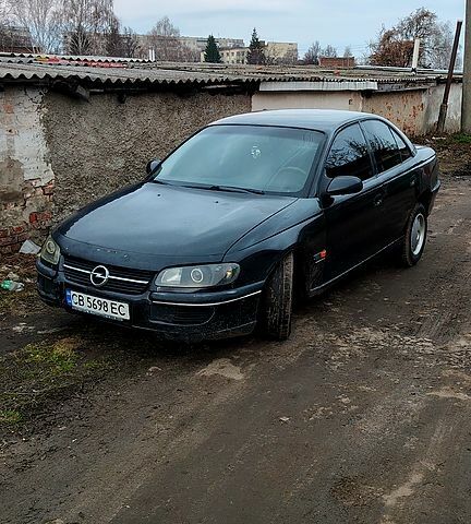 Черный Опель Омега, объемом двигателя 2 л и пробегом 320 тыс. км за 1700 $, фото 1 на Automoto.ua