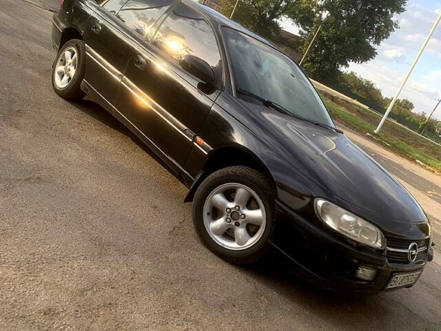 Черный Опель Омега, объемом двигателя 2 л и пробегом 313 тыс. км за 2550 $, фото 1 на Automoto.ua