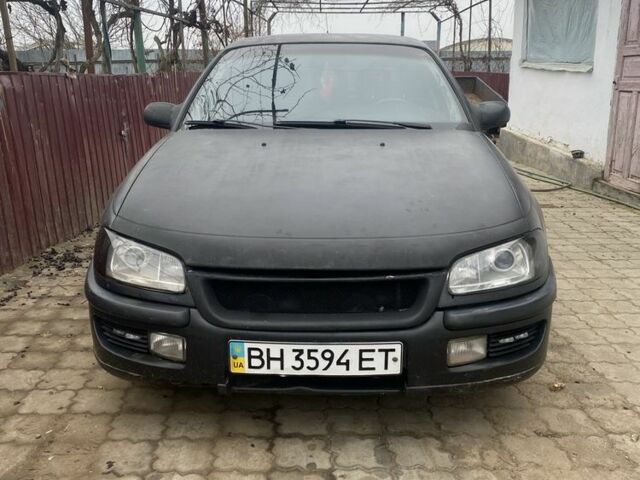 Чорний Опель Омега, об'ємом двигуна 2 л та пробігом 300 тис. км за 2100 $, фото 1 на Automoto.ua