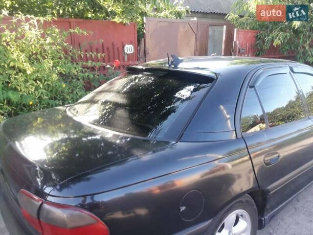 Черный Опель Омега, объемом двигателя 3 л и пробегом 241 тыс. км за 3200 $, фото 1 на Automoto.ua