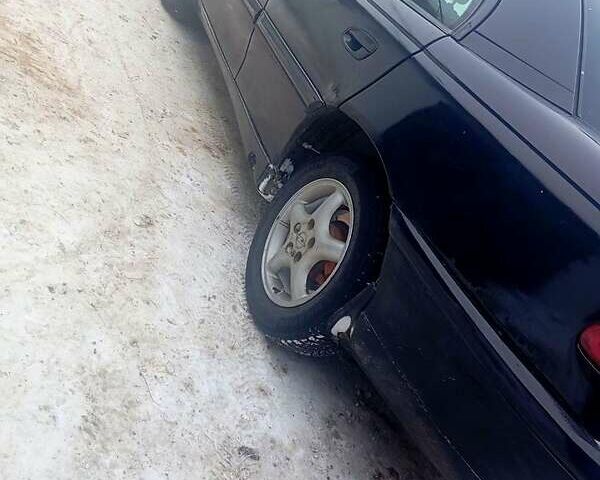 Чорний Опель Омега, об'ємом двигуна 2 л та пробігом 230 тис. км за 1700 $, фото 1 на Automoto.ua