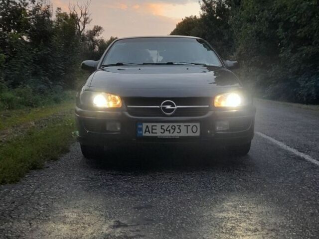 Чорний Опель Омега, об'ємом двигуна 2 л та пробігом 300 тис. км за 1450 $, фото 1 на Automoto.ua