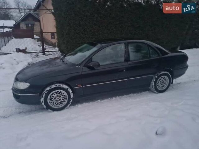 Черный Опель Омега, объемом двигателя 2 л и пробегом 231 тыс. км за 1299 $, фото 1 на Automoto.ua