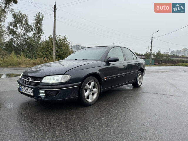 Черный Опель Омега, объемом двигателя 2.5 л и пробегом 400 тыс. км за 1499 $, фото 1 на Automoto.ua