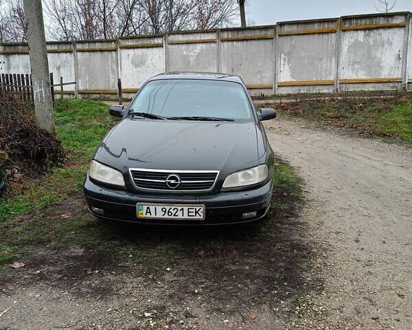 Черный Опель Омега, объемом двигателя 3 л и пробегом 361 тыс. км за 2500 $, фото 1 на Automoto.ua