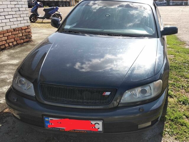 Черный Опель Омега, объемом двигателя 2.5 л и пробегом 300 тыс. км за 3500 $, фото 1 на Automoto.ua