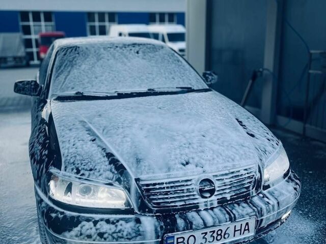 Чорний Опель Омега, об'ємом двигуна 2.5 л та пробігом 305 тис. км за 4000 $, фото 1 на Automoto.ua