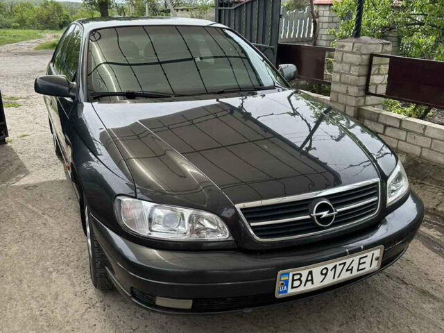 Чорний Опель Омега, об'ємом двигуна 2.2 л та пробігом 300 тис. км за 3000 $, фото 1 на Automoto.ua