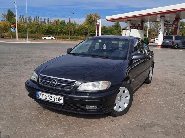 Чорний Опель Омега, об'ємом двигуна 2.2 л та пробігом 144 тис. км за 4500 $, фото 1 на Automoto.ua