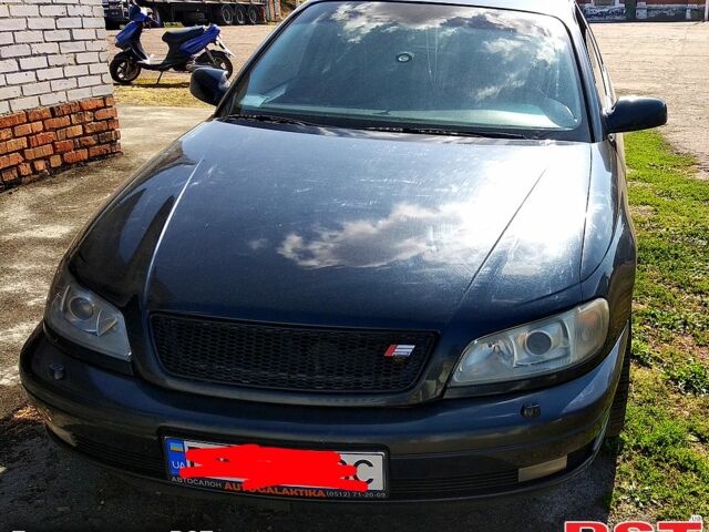 Чорний Опель Омега, об'ємом двигуна 2.5 л та пробігом 300 тис. км за 3400 $, фото 1 на Automoto.ua