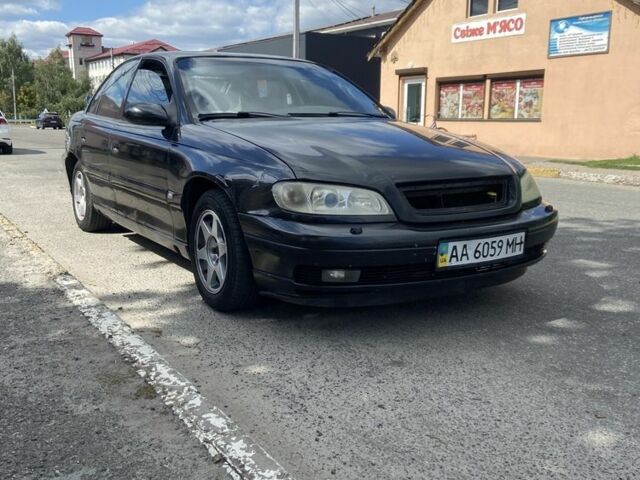 Чорний Опель Омега, об'ємом двигуна 2.5 л та пробігом 240 тис. км за 2800 $, фото 1 на Automoto.ua