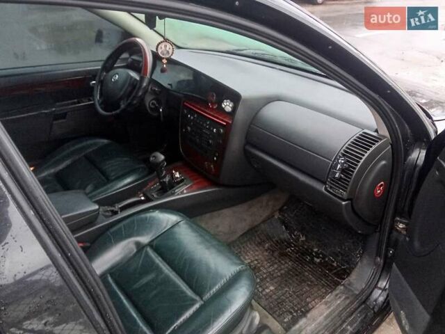 Черный Опель Омега, объемом двигателя 2.5 л и пробегом 115 тыс. км за 2100 $, фото 1 на Automoto.ua