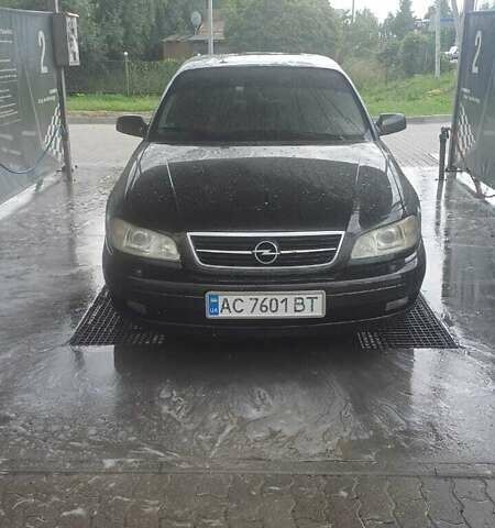 Черный Опель Омега, объемом двигателя 2.2 л и пробегом 355 тыс. км за 3700 $, фото 1 на Automoto.ua