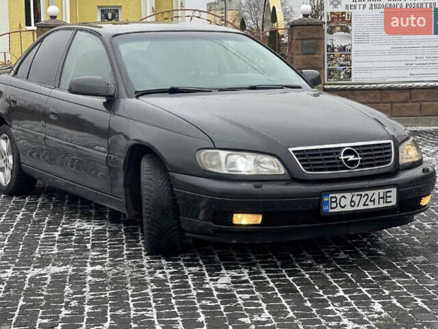 Черный Опель Омега, объемом двигателя 2.2 л и пробегом 450 тыс. км за 2550 $, фото 1 на Automoto.ua
