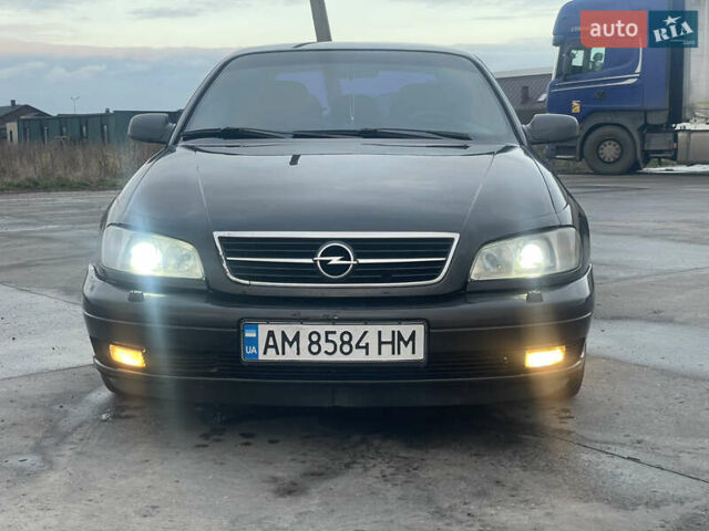 Черный Опель Омега, объемом двигателя 2.17 л и пробегом 374 тыс. км за 3100 $, фото 1 на Automoto.ua