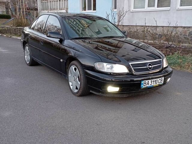 Чорний Опель Омега, об'ємом двигуна 2.6 л та пробігом 260 тис. км за 3100 $, фото 1 на Automoto.ua