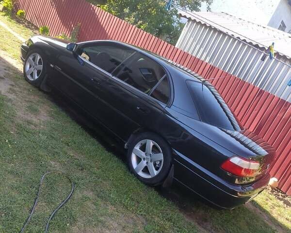 Черный Опель Омега, объемом двигателя 2.6 л и пробегом 434 тыс. км за 3500 $, фото 1 на Automoto.ua