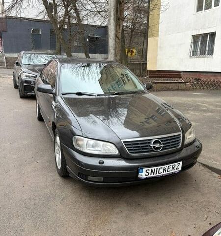 Черный Опель Омега, объемом двигателя 2.6 л и пробегом 409 тыс. км за 3700 $, фото 1 на Automoto.ua