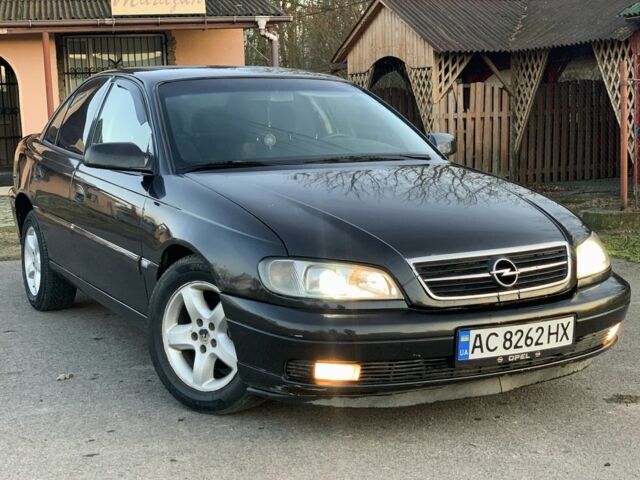 Черный Опель Омега, объемом двигателя 2.2 л и пробегом 450 тыс. км за 2600 $, фото 1 на Automoto.ua