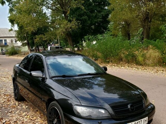 Чорний Опель Омега, об'ємом двигуна 2.2 л та пробігом 350 тис. км за 3100 $, фото 1 на Automoto.ua