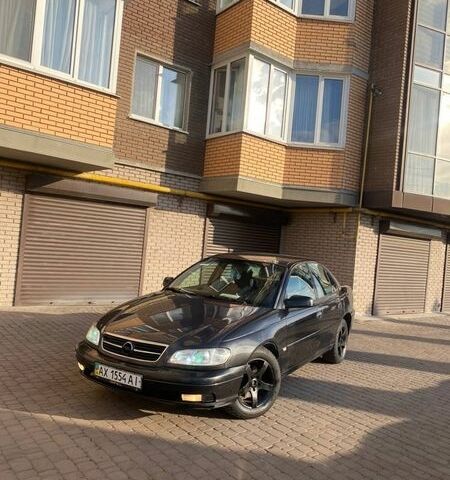 Чорний Опель Омега, об'ємом двигуна 2.2 л та пробігом 320 тис. км за 2100 $, фото 1 на Automoto.ua