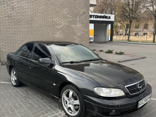 Черный Опель Омега, объемом двигателя 3.2 л и пробегом 225 тыс. км за 2400 $, фото 1 на Automoto.ua
