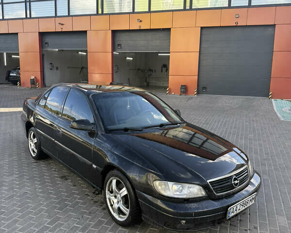 Чорний Опель Омега, об'ємом двигуна 3.2 л та пробігом 305 тис. км за 3100 $, фото 1 на Automoto.ua