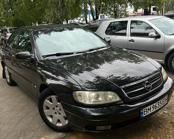 Черный Опель Омега, объемом двигателя 2.17 л и пробегом 330 тыс. км за 3300 $, фото 1 на Automoto.ua