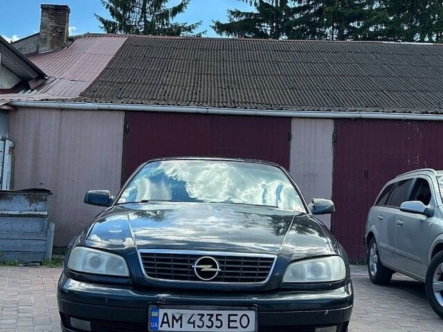 Черный Опель Омега, объемом двигателя 2.6 л и пробегом 333 тыс. км за 2800 $, фото 1 на Automoto.ua