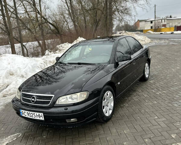 Чорний Опель Омега, об'ємом двигуна 2.2 л та пробігом 346 тис. км за 3500 $, фото 1 на Automoto.ua
