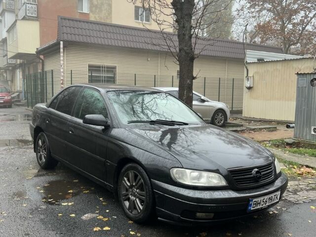Черный Опель Омега, объемом двигателя 2.2 л и пробегом 222 тыс. км за 2999 $, фото 1 на Automoto.ua