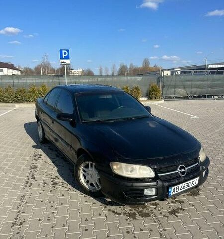 Черный Опель Омега, объемом двигателя 2 л и пробегом 600 тыс. км за 1100 $, фото 1 на Automoto.ua