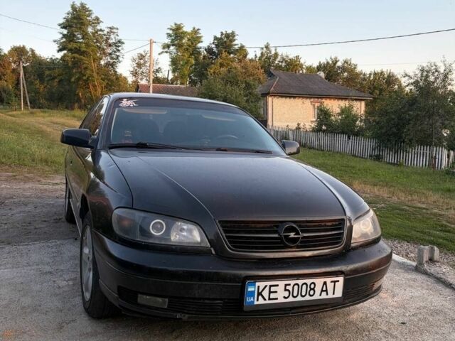 Черный Опель Омега, объемом двигателя 2.6 л и пробегом 330 тыс. км за 2710 $, фото 1 на Automoto.ua